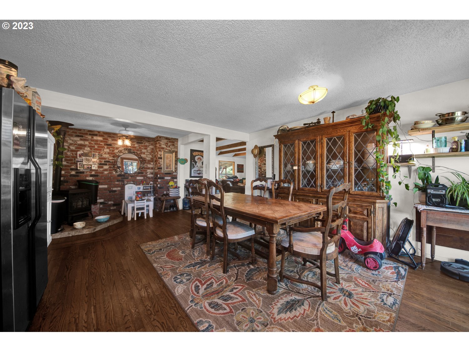 67100 Fryrear Road Bend, OR 97703 - Photo 12 of 37 a living room with furniture and a wooden floor