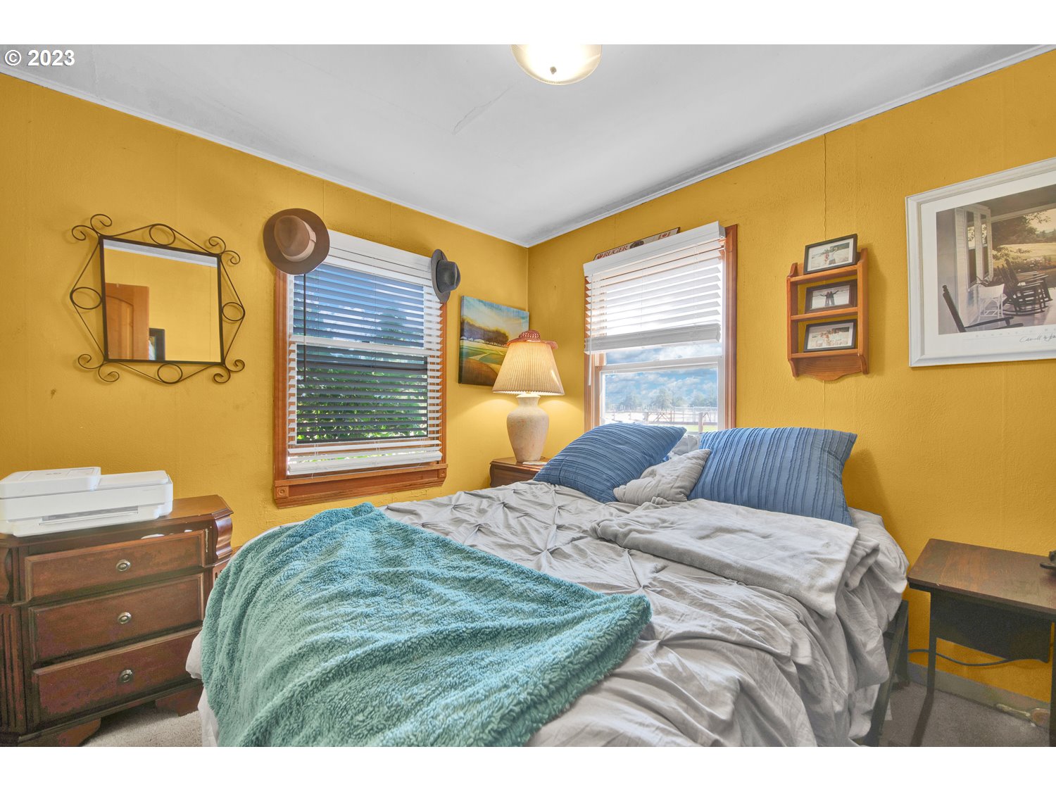 67100 Fryrear Road Bend, OR 97703 - Photo 15 of 37 a bedroom with a bed and a dresser