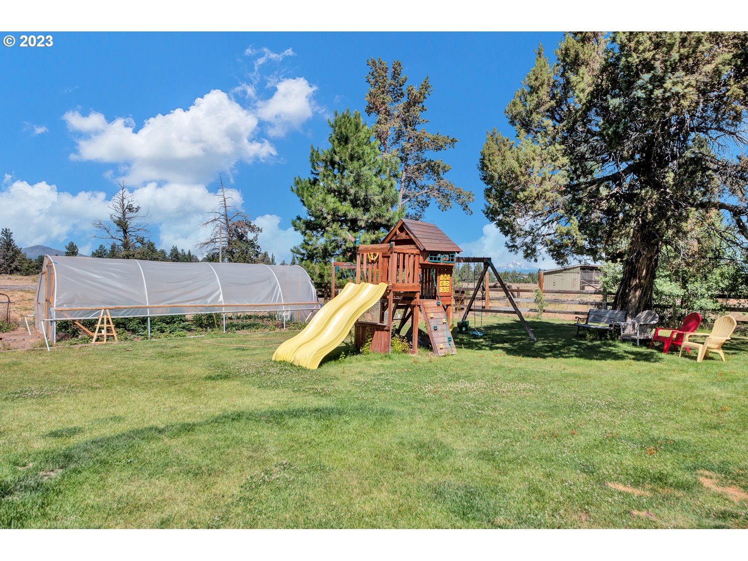 67100 Fryrear Road Bend, OR 97703 - Photo 18 of 37 a childrens park with lots of swings and slides