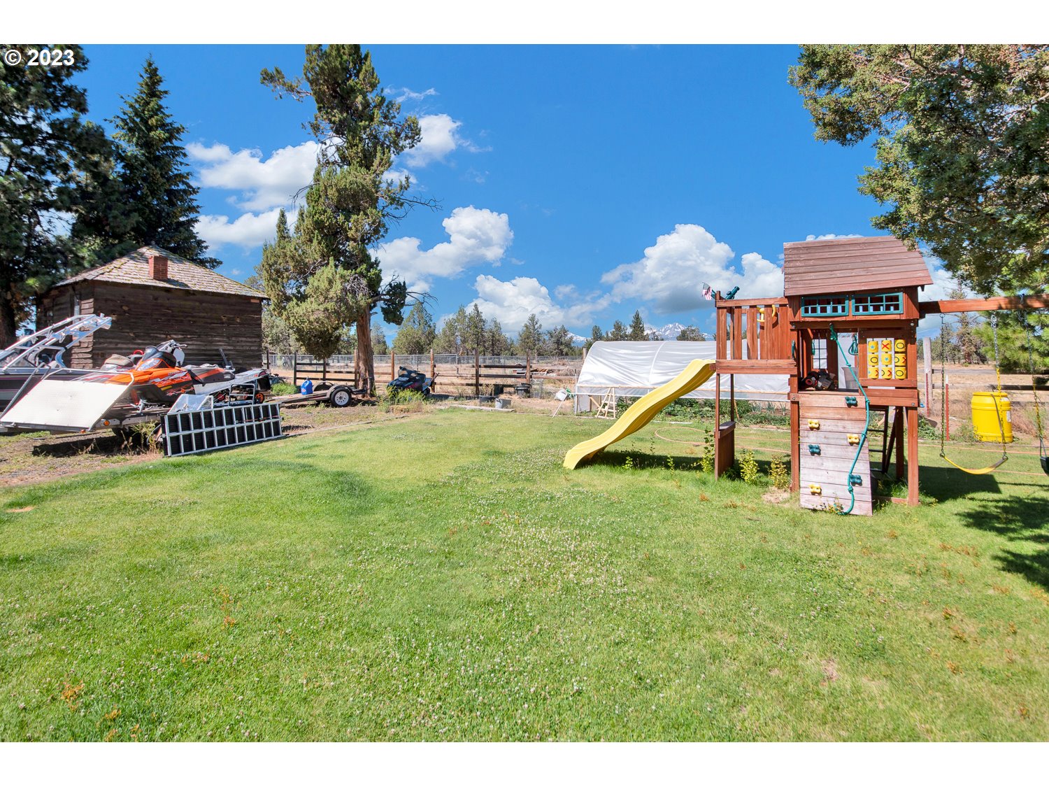 67100 Fryrear Road Bend, OR 97703 - Photo 19 of 37 a childrens park with lots of swings and slides