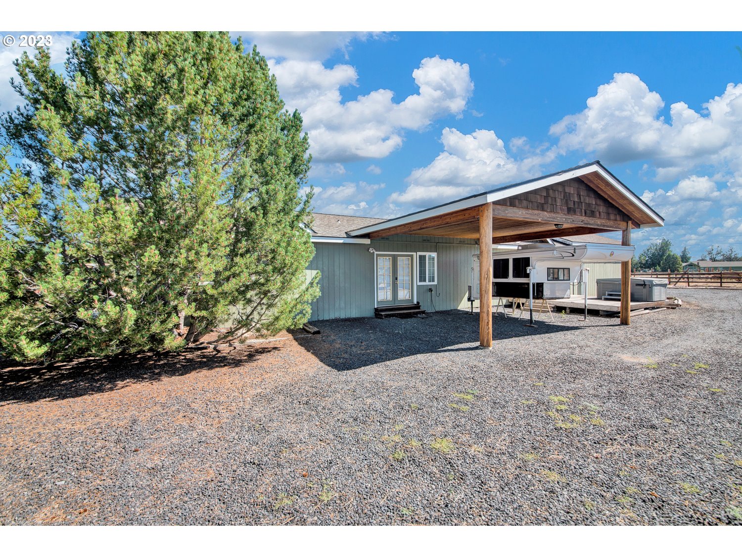 67100 Fryrear Road Bend, OR 97703 - Photo 24 of 37 a view of a house with a yard