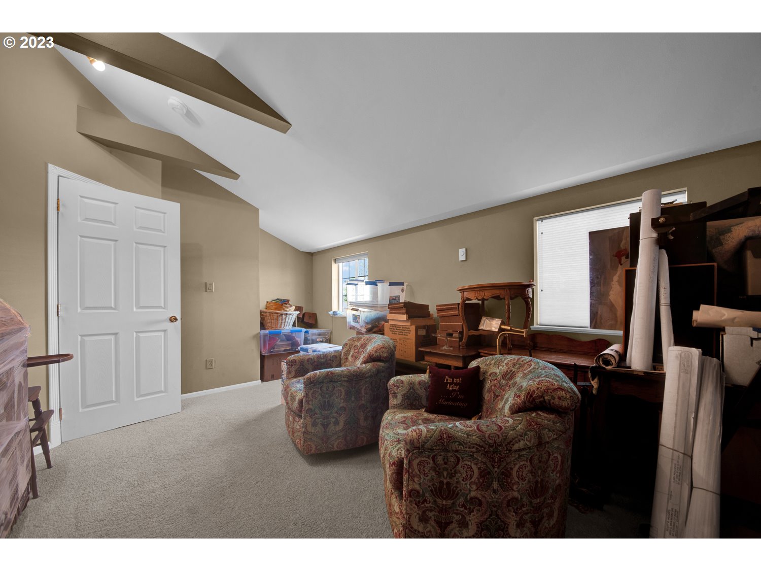 67100 Fryrear Road Bend, OR 97703 - Photo 30 of 37 a living room with furniture and a flat screen tv