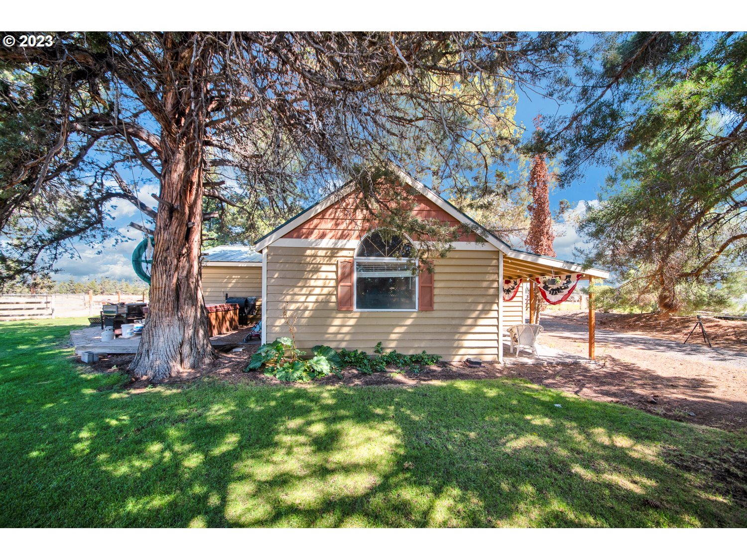 67100 Fryrear Road Bend, OR 97703 - Photo 6 of 37 a backyard of a house with lots of green space
