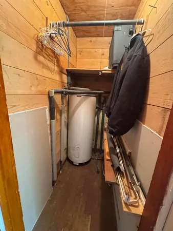 a view of a room with wooden walls