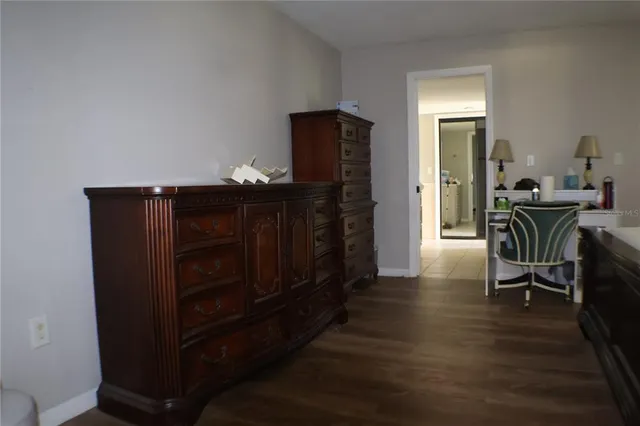 a utility room with cabinets washer and dryer