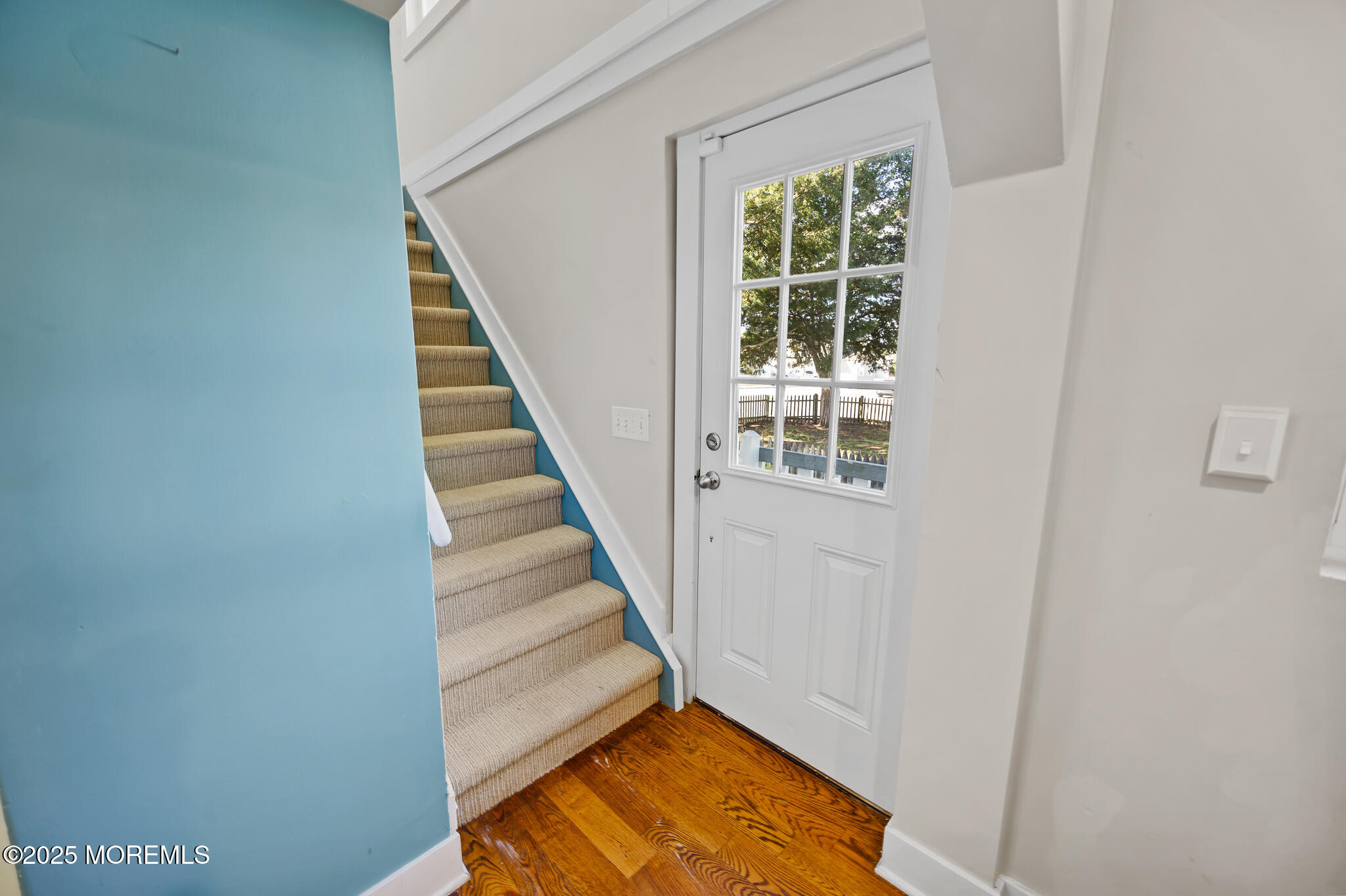 605 Ocean Gate Avenue Ocean Gate, NJ 08740 - Photo 26 of 45 a view of entryway with wooden floor and stairs