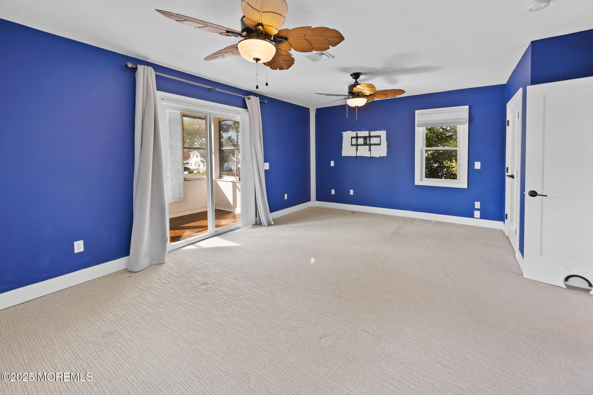 605 Ocean Gate Avenue Ocean Gate, NJ 08740 - Photo 30 of 45 a view of a livingroom with a ceiling fan