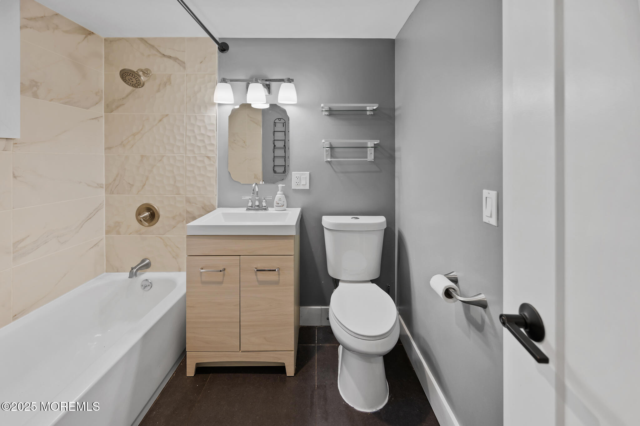 605 Ocean Gate Avenue Ocean Gate, NJ 08740 - Photo 38 of 45 a bathroom with a sink toilet and shower