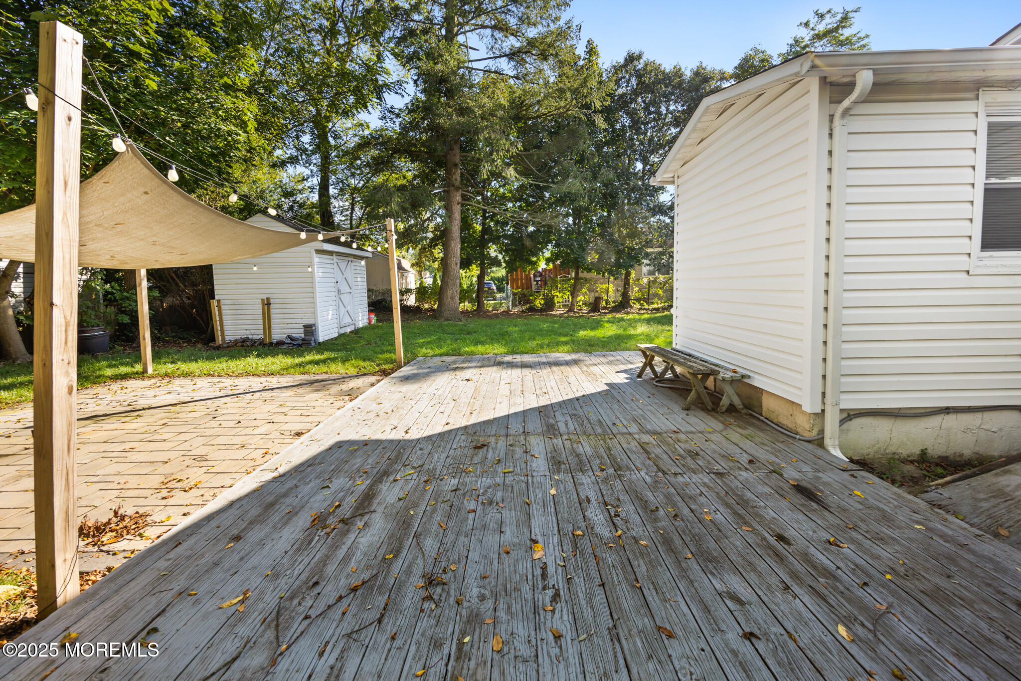 605 Ocean Gate Avenue Ocean Gate, NJ 08740 - Photo 42 of 45 a view of a backyard of the house