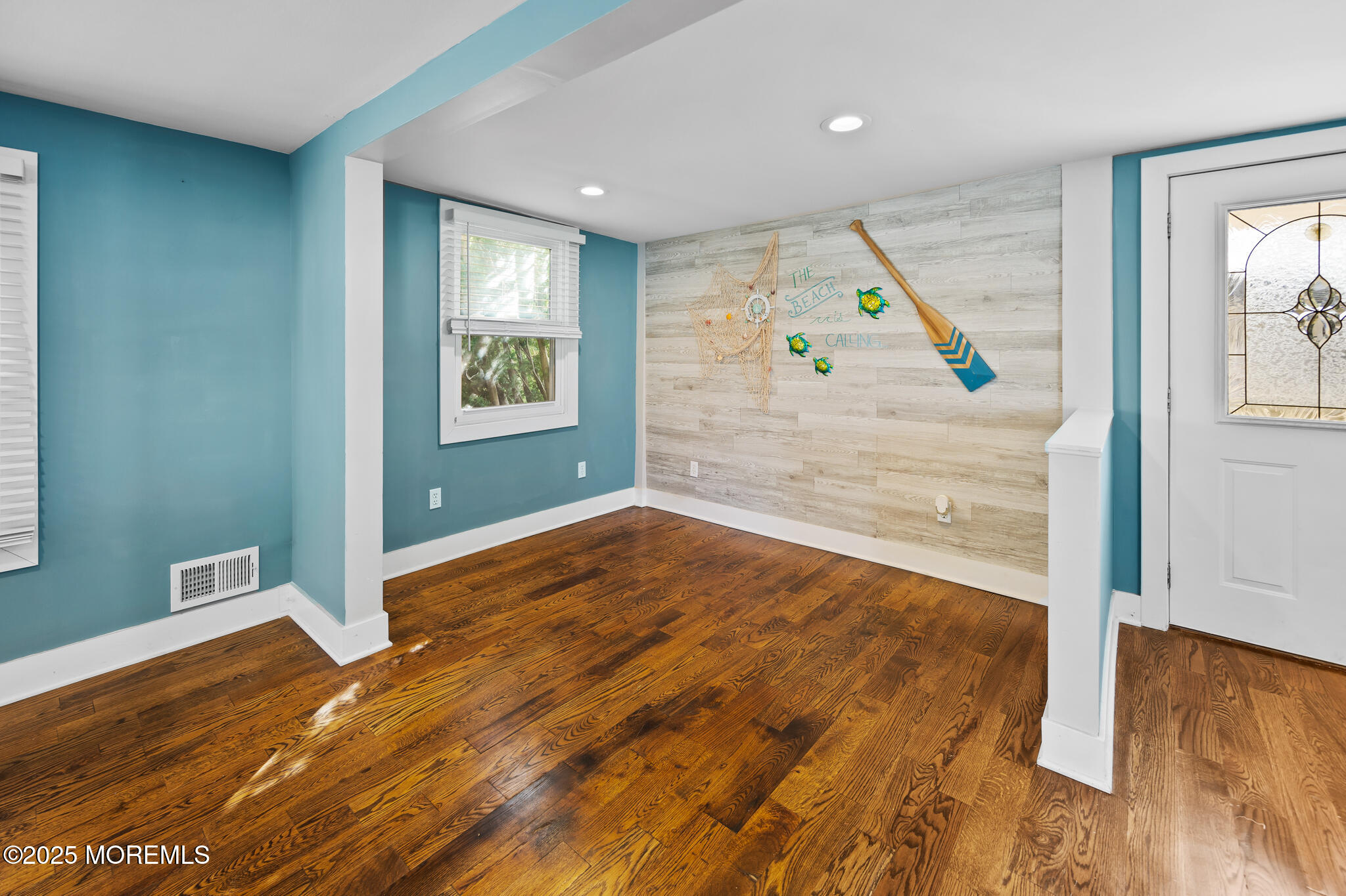 605 Ocean Gate Avenue Ocean Gate, NJ 08740 - Photo 8 of 45 a view of livingroom with hardwood floor and hallway