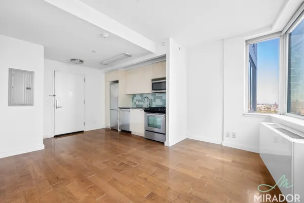 a view of a kitchen with a sink