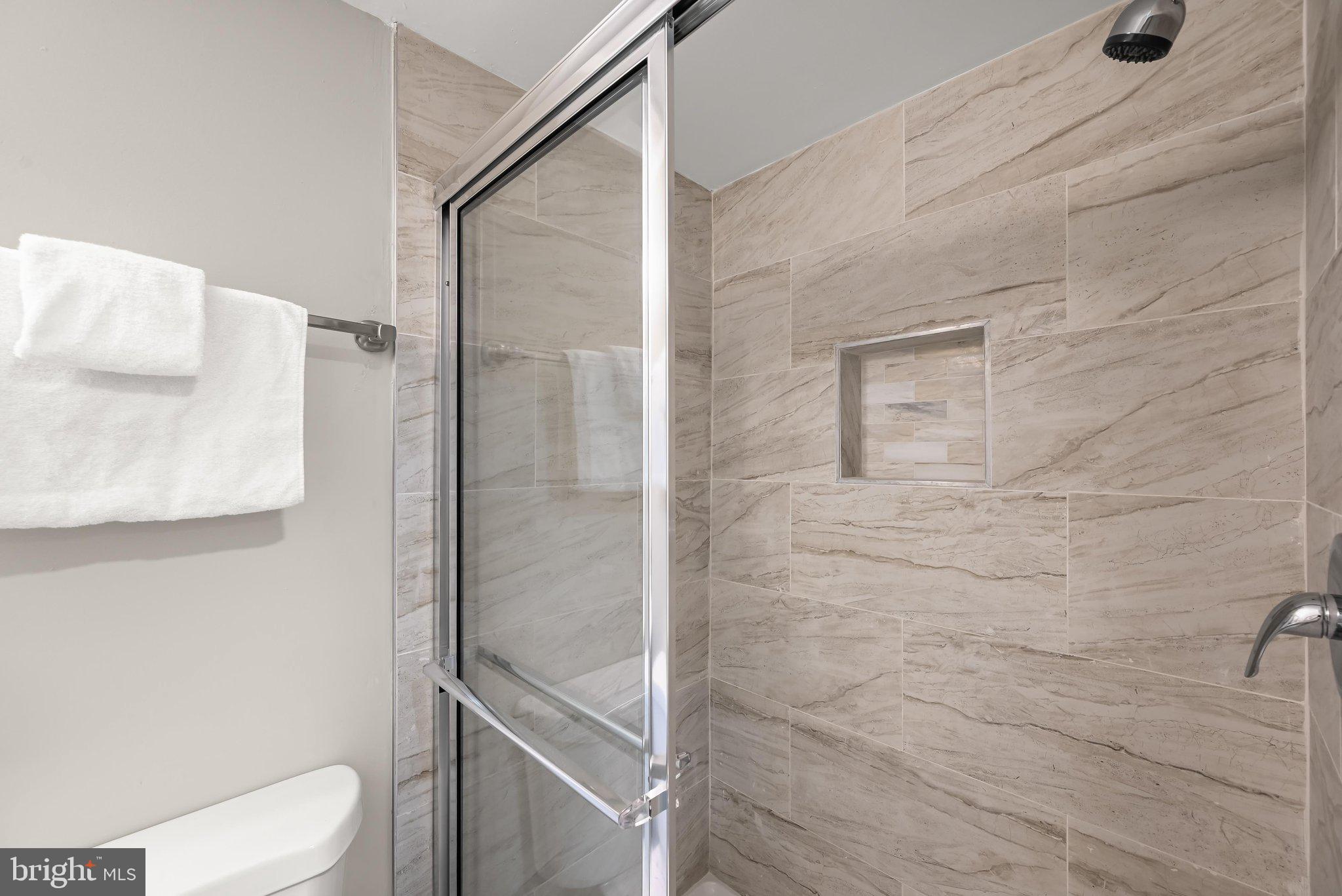 6035 Moorehead Road Baltimore, MD 21228 - Photo 32 of 43 Remodeled full bathroom