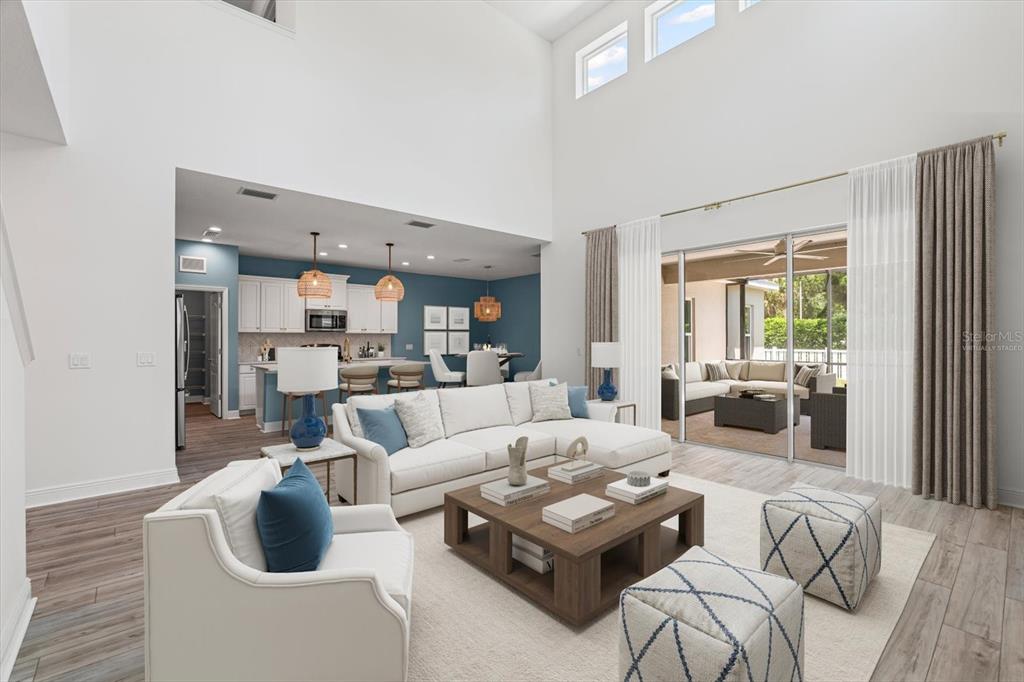 4457 Sage Grn Terrace Sarasota, FL 34243 - Photo 12 of 51 a living room with furniture and a large window