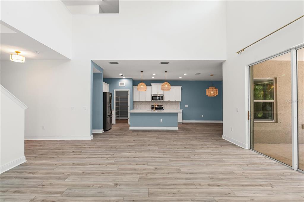 4457 Sage Grn Terrace Sarasota, FL 34243 - Photo 15 of 51 a view of a kitchen with wooden floor