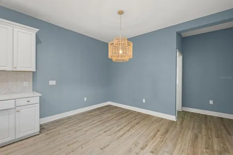 a view of a room with rack on the wall