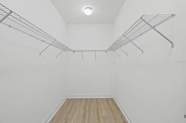 a view of a room with racks on the wall