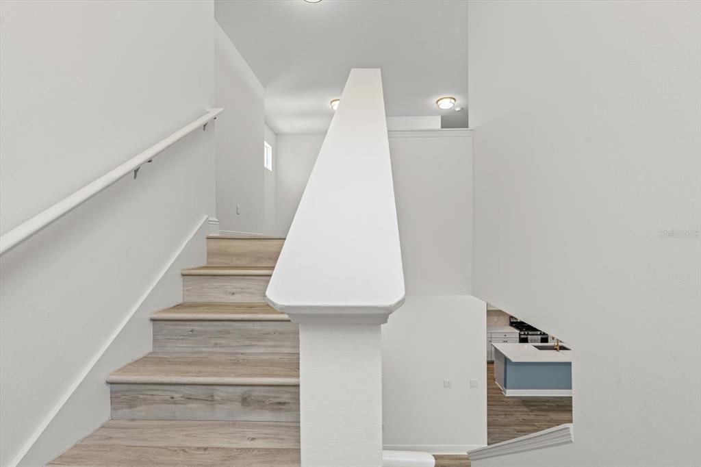 4457 Sage Grn Terrace Sarasota, FL 34243 - Photo 32 of 51 a view of entryway with furniture and wooden floor