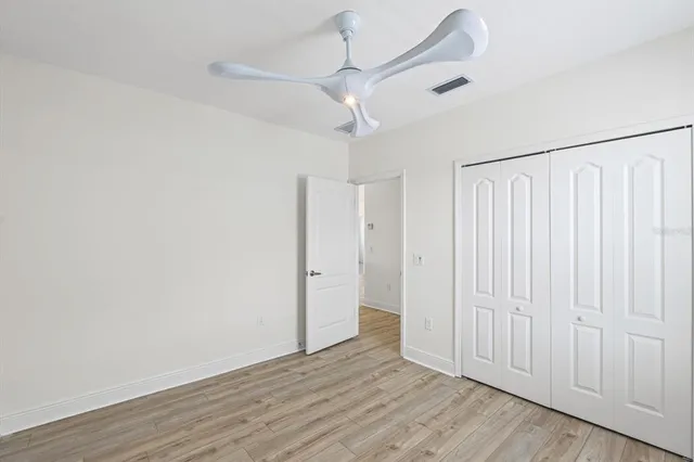 a view of an house with backyard space and garden
