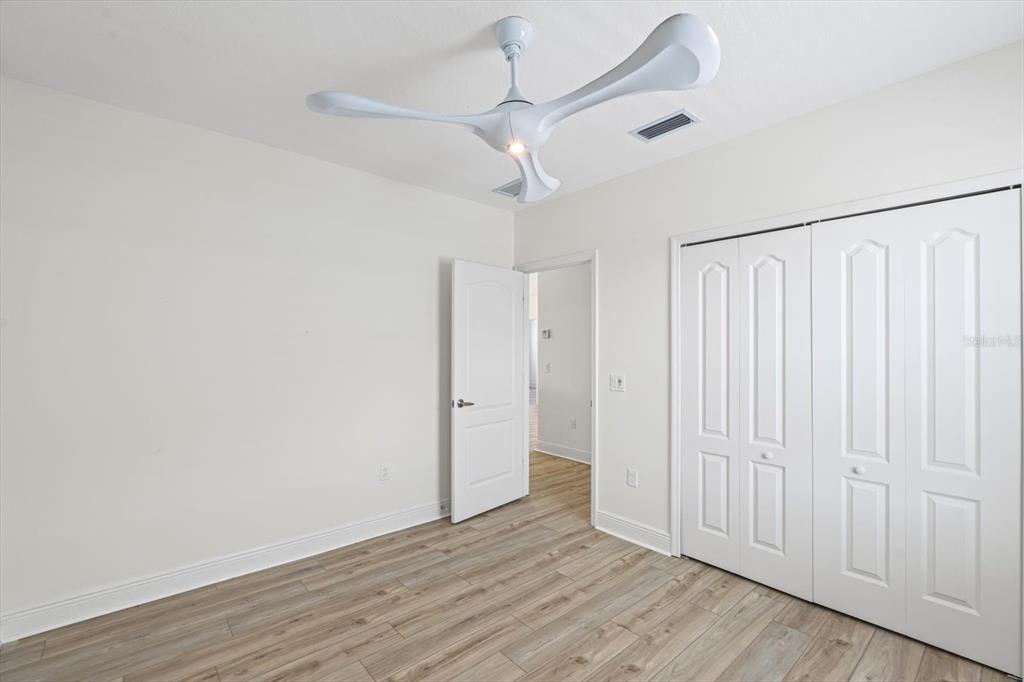 4457 Sage Grn Terrace Sarasota, FL 34243 - Photo 43 of 51 a view of entryway with wooden floor