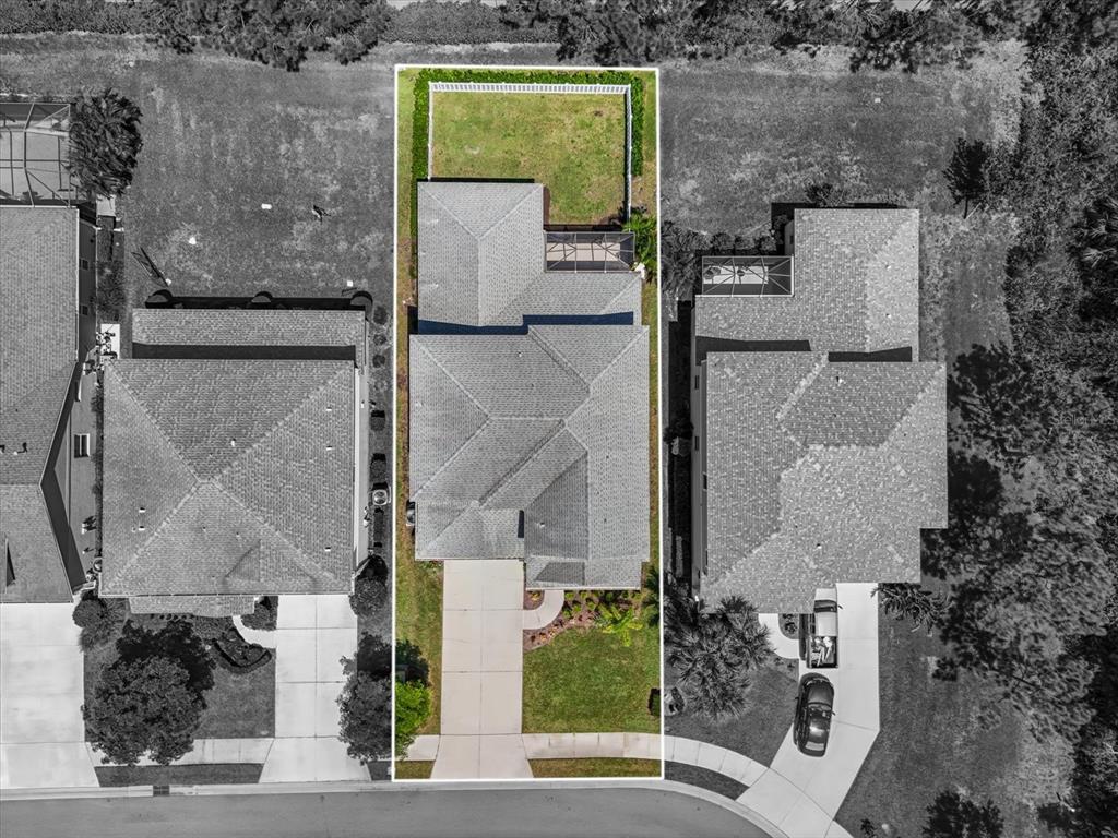 4457 Sage Grn Terrace Sarasota, FL 34243 - Photo 47 of 51 an aerial view of a house with a yard