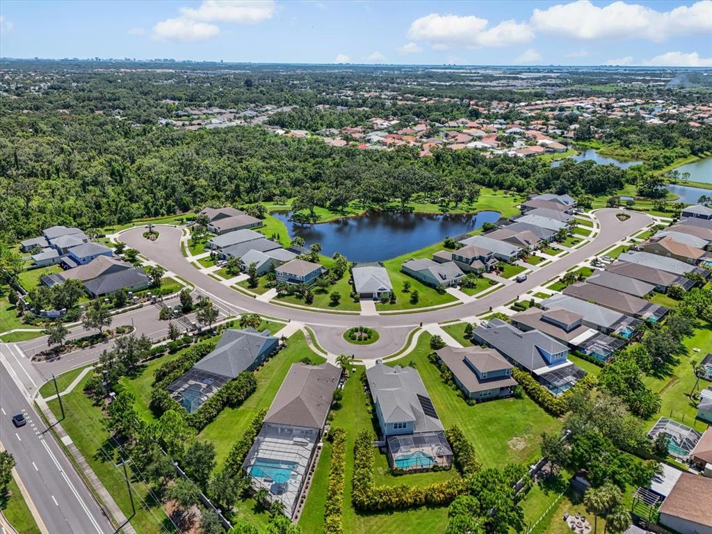 4457 Sage Grn Terrace Sarasota, FL 34243 - Photo 51 of 51 an aerial view of residential houses with outdoor space
