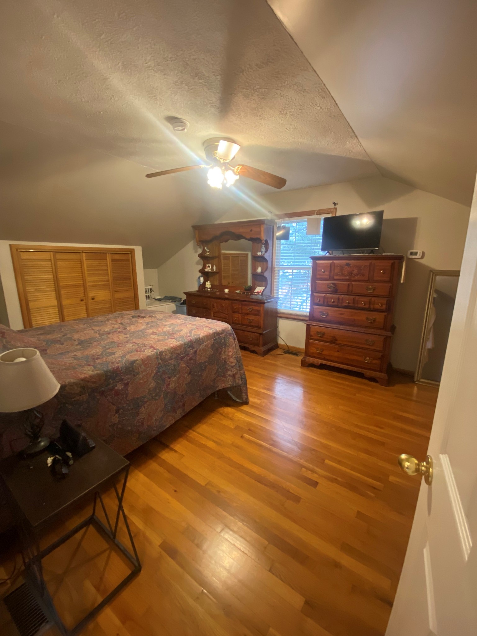 1885 Luther Sharp Road Columbia, TN 38401 - Photo 21 of 24 a bedroom with a bed and wooden floor