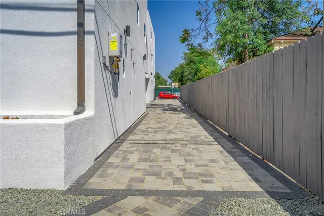 a view of a yard and patio