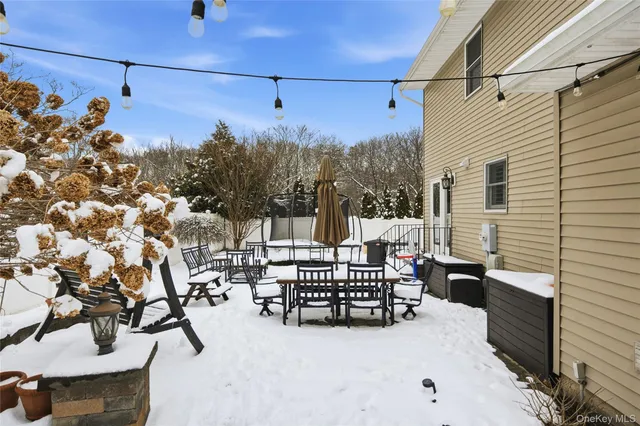a view of balcony with furniture