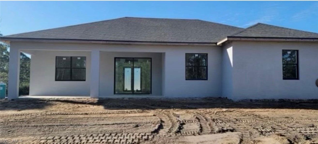 1907 West 9th Street Lehigh Acres, FL 33972 - Photo 2 of 3 a front view of a house