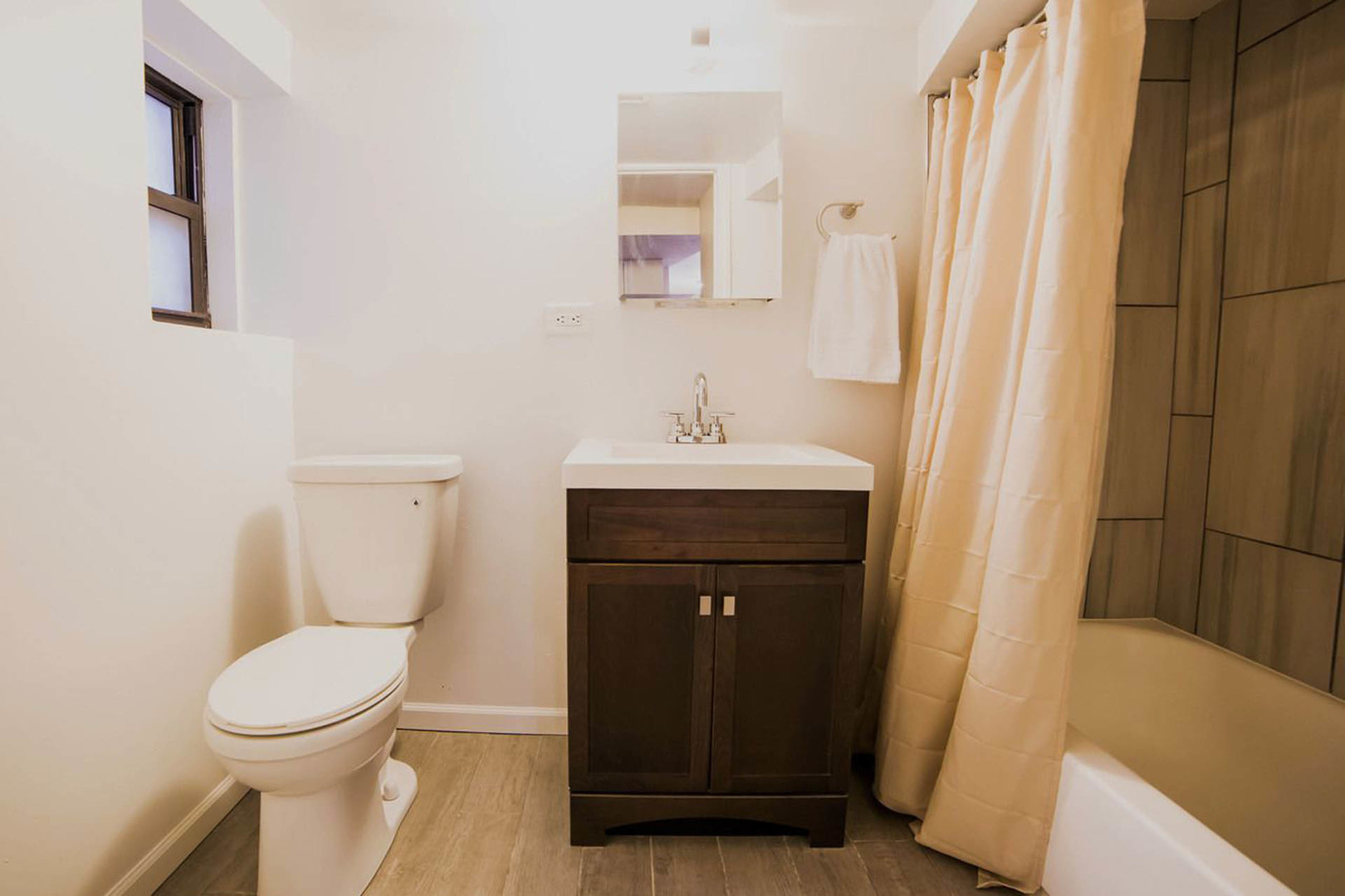 4136 West Palmer Street Chicago, IL 60639 - Photo 30 of 35 a bathroom with a sink and a toilet