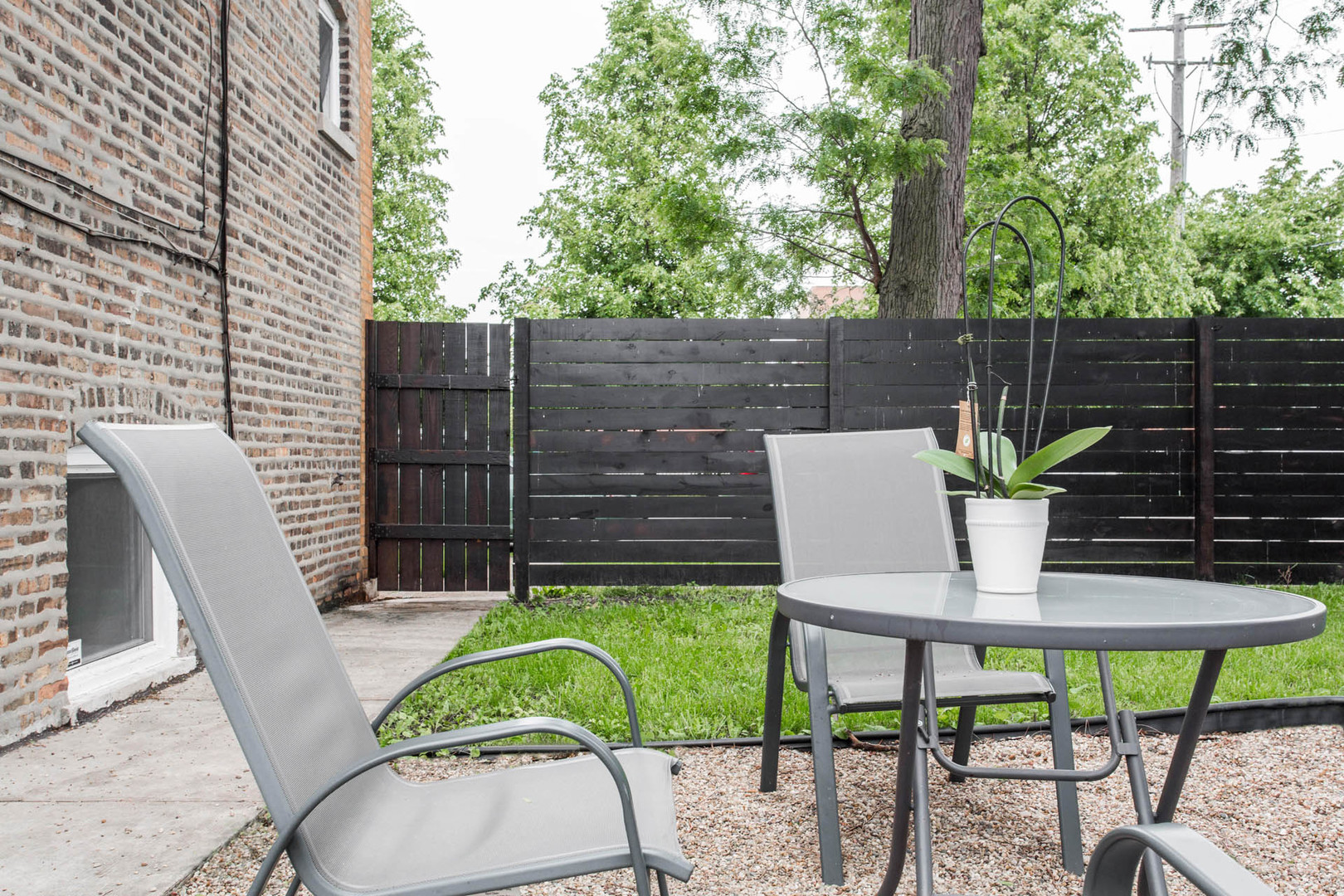 4136 West Palmer Street Chicago, IL 60639 - Photo 32 of 35 a view of a chairs and table in the patio