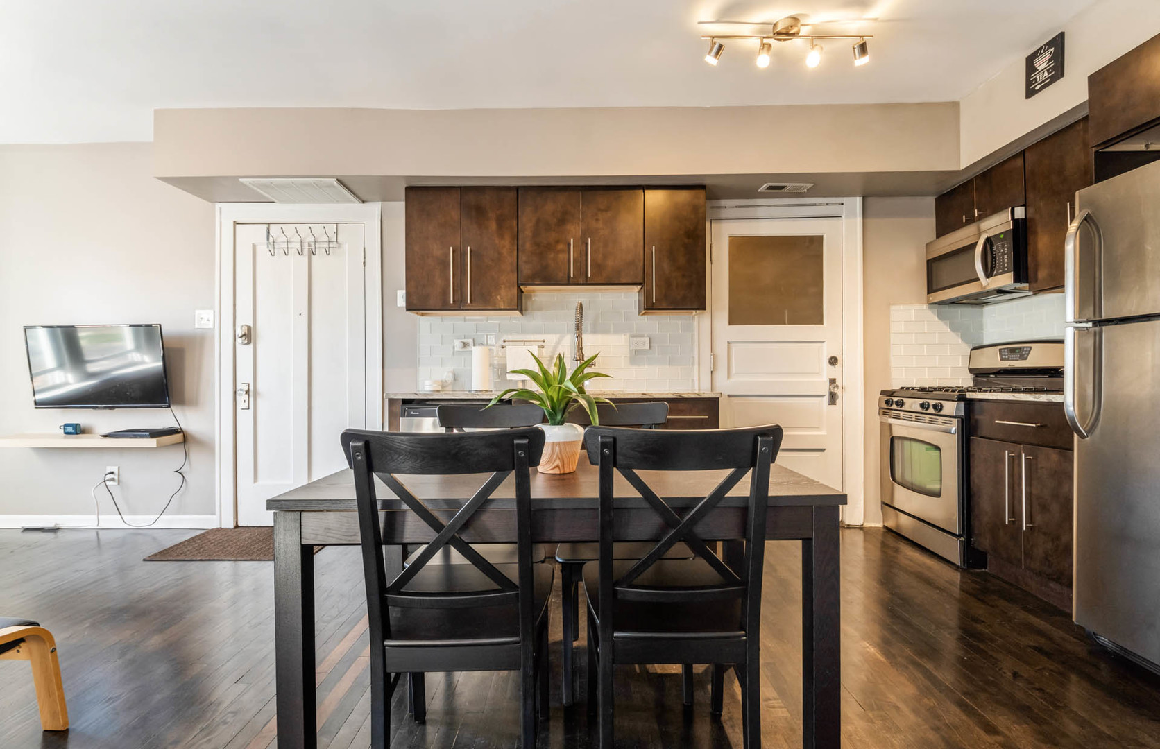 4136 West Palmer Street Chicago, IL 60639 - Photo 5 of 35 a view of a dining room with furniture and wooden floor
