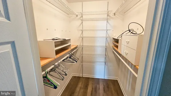a view of entryway with wooden floor