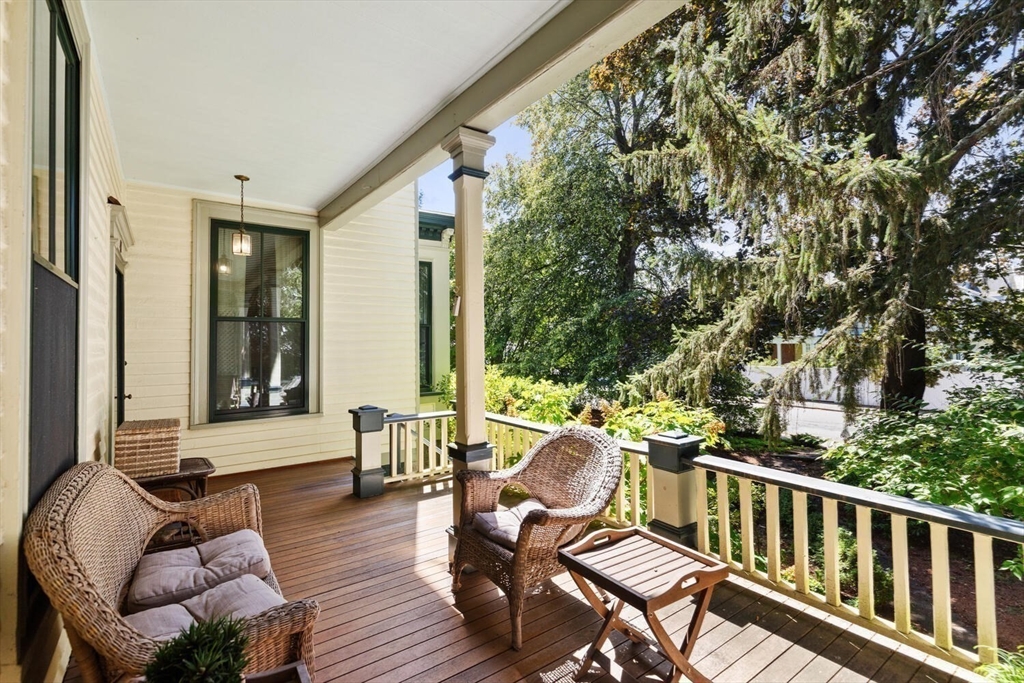 41 Dearborn Street Salem, MA 01970 - Photo 13 of 37 a outdoor living space with furniture and wooden floor