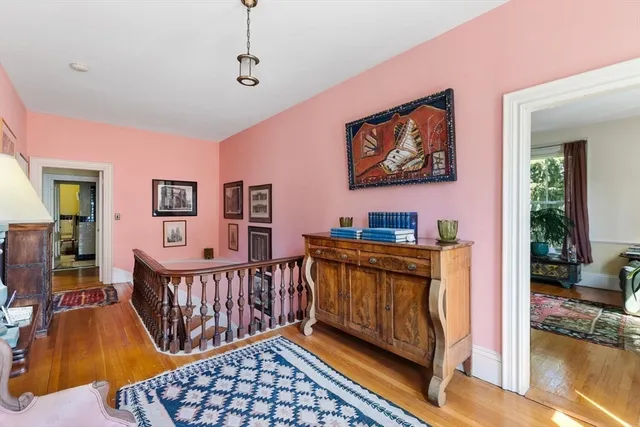 a view of a bedroom with furniture and windows