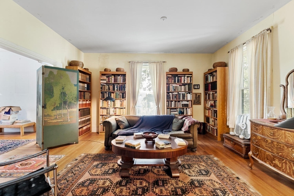 41 Dearborn Street Salem, MA 01970 - Photo 21 of 37 a living room with furniture and a wooden floor