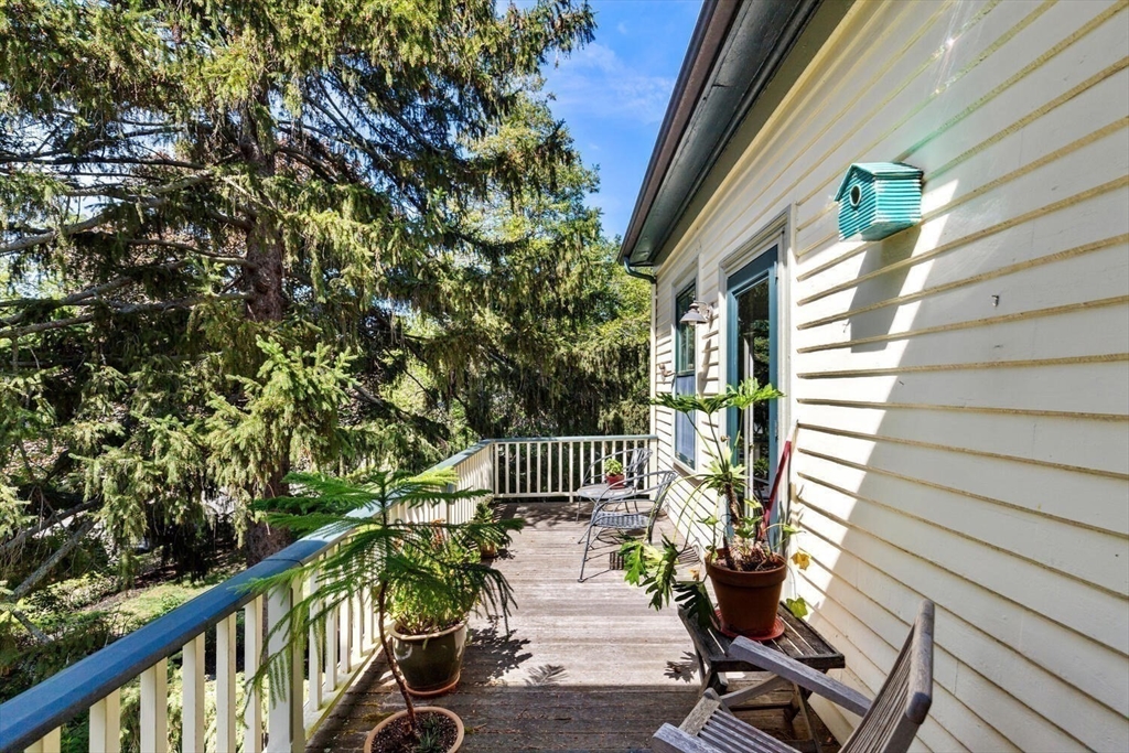 41 Dearborn Street Salem, MA 01970 - Photo 27 of 37 a view of balcony with wooden floor