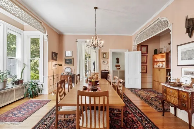 a view of a livingroom with furniture window and wooden floor
