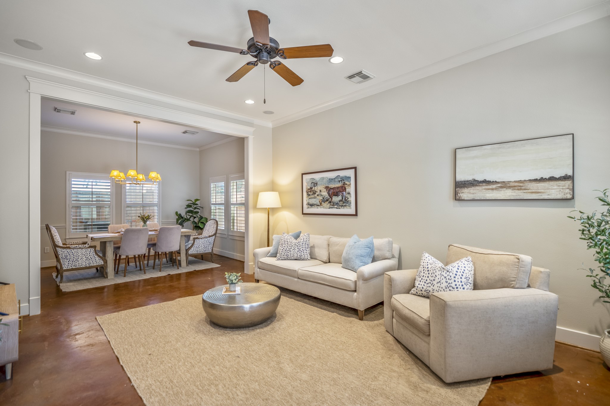 905 West 23rd Street Houston, TX 77008 - Photo 7 of 46 This beautifully appointed living and dining space offers comfort, style, and the perfect ambiance for entertaining.