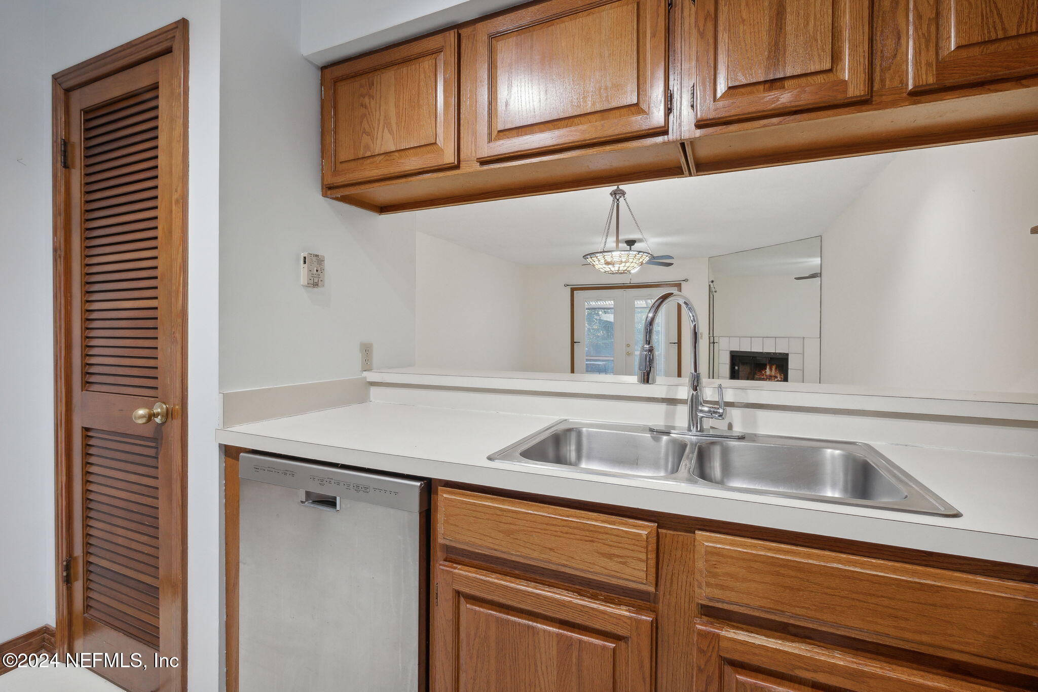10800 Old St Augustine Road, Unit 204 Jacksonville, FL 32257 - Photo 12 of 30 a kitchen with stainless steel appliances granite countertop a sink and cabinets