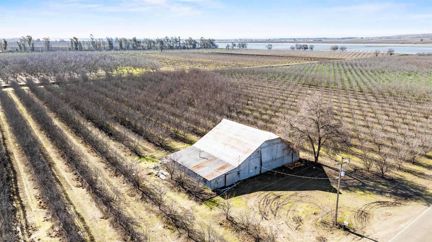 0 Sanders Road Live Oak, CA 95953 - Photo 12 of 17 a view of a lake with houses in the back
