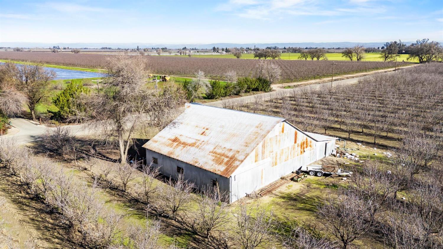 0 Sanders Road Live Oak, CA 95953 - Photo 13 of 17 a view of a lake with houses in the back