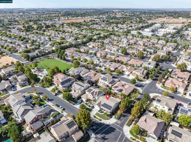 an aerial view of a city with lots of residential buildings