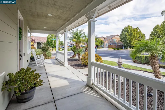 a view of a porch with wooden floor