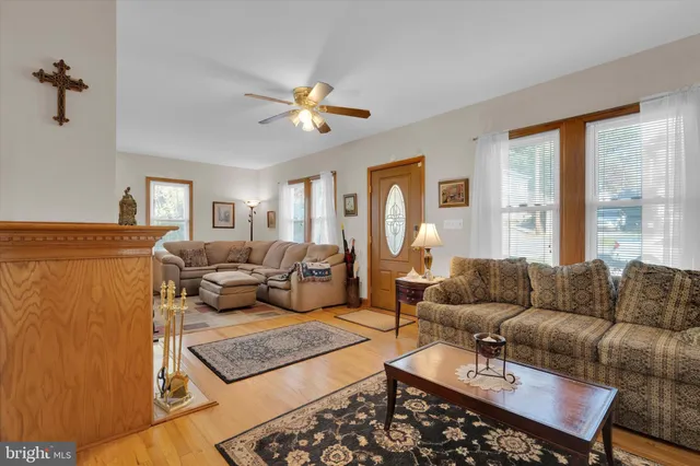a living room with furniture or couch and a window