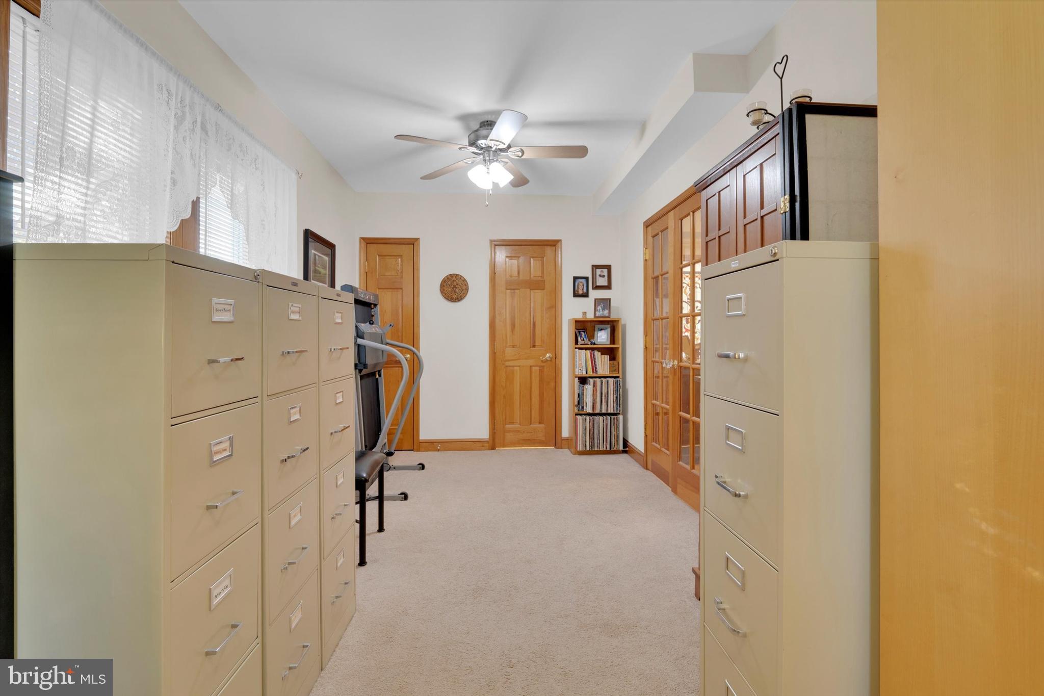 102 Catalpa Road Linthicum Heights, MD 21090 - Photo 17 of 49 a view of a kitchen with closet and workspace