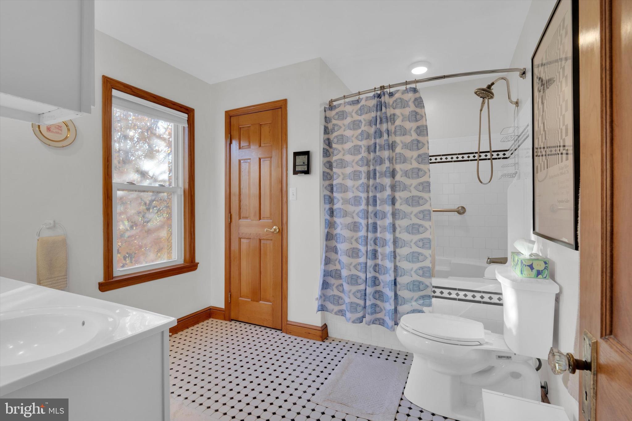 102 Catalpa Road Linthicum Heights, MD 21090 - Photo 36 of 49 a bathroom with a shower toilet and sink