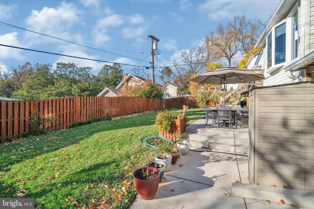 a view of yard with outdoor seating