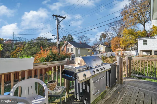 a view of a deck with furniture