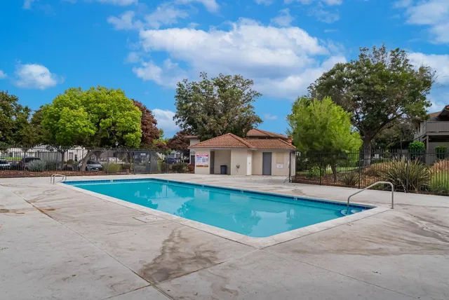 a view of a house with a swimming pool